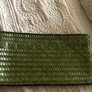 Pocket for use to move things from purse and back to purse. 10x5.5x0.25 in